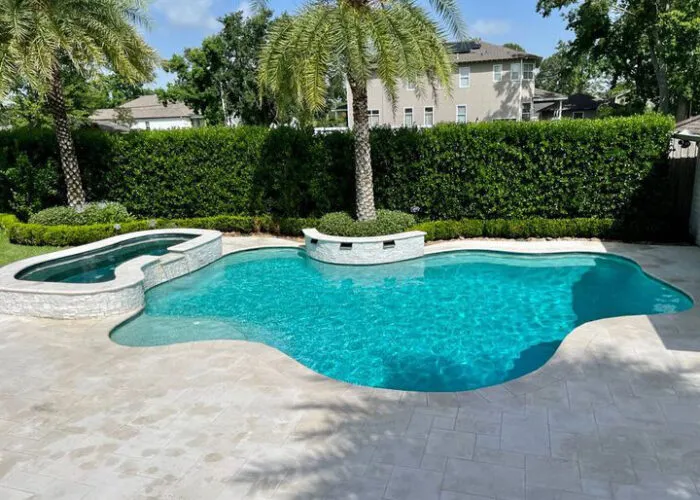 pool & spa water feature in backyard